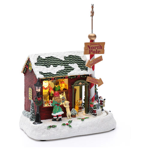 Scenka świąteczna podświetlana grająca Dom Świętego Mikołaja ruchome krasnoludki 30x25x17 cm 3