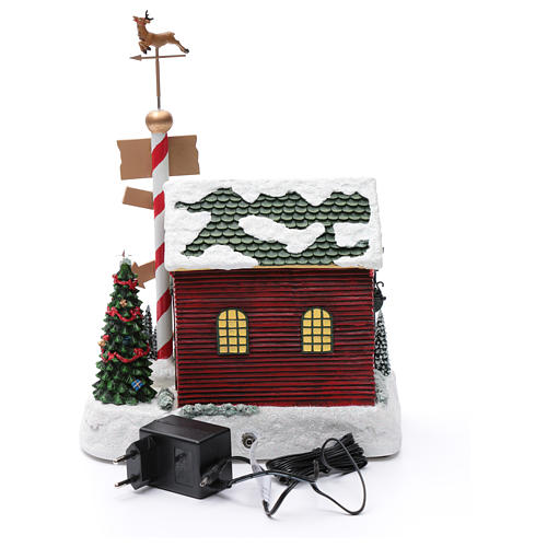 Scenka świąteczna podświetlana grająca Dom Świętego Mikołaja ruchome krasnoludki 30x25x17 cm 5