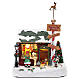 Scenka świąteczna podświetlana grająca Dom Świętego Mikołaja ruchome krasnoludki 30x25x17 cm s1