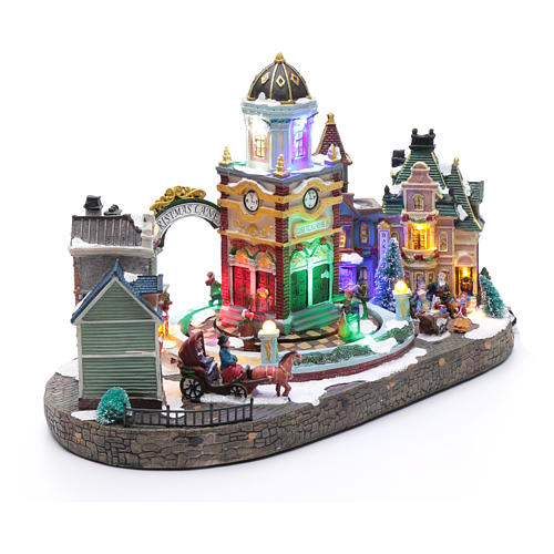 Cenário natalino em miniatura iluminado com música e movimento, torre do relógio 3