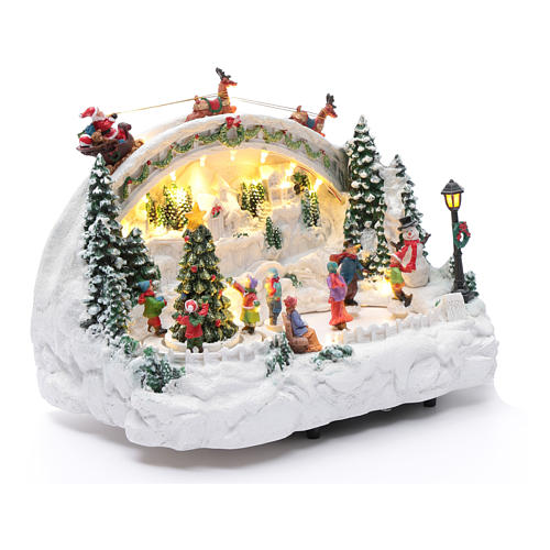 Villaggio natalizio bianco luminoso musica movim pattinatori albero natale 24X33X21 cm 3
