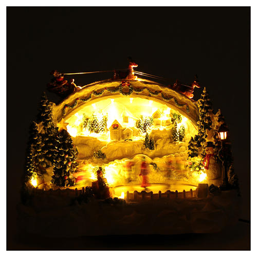 Bożonarodzeniowe miasteczko białe podświetlane muzyczne ruchomi łyżwiarze choinka 24x33x21 cm 4