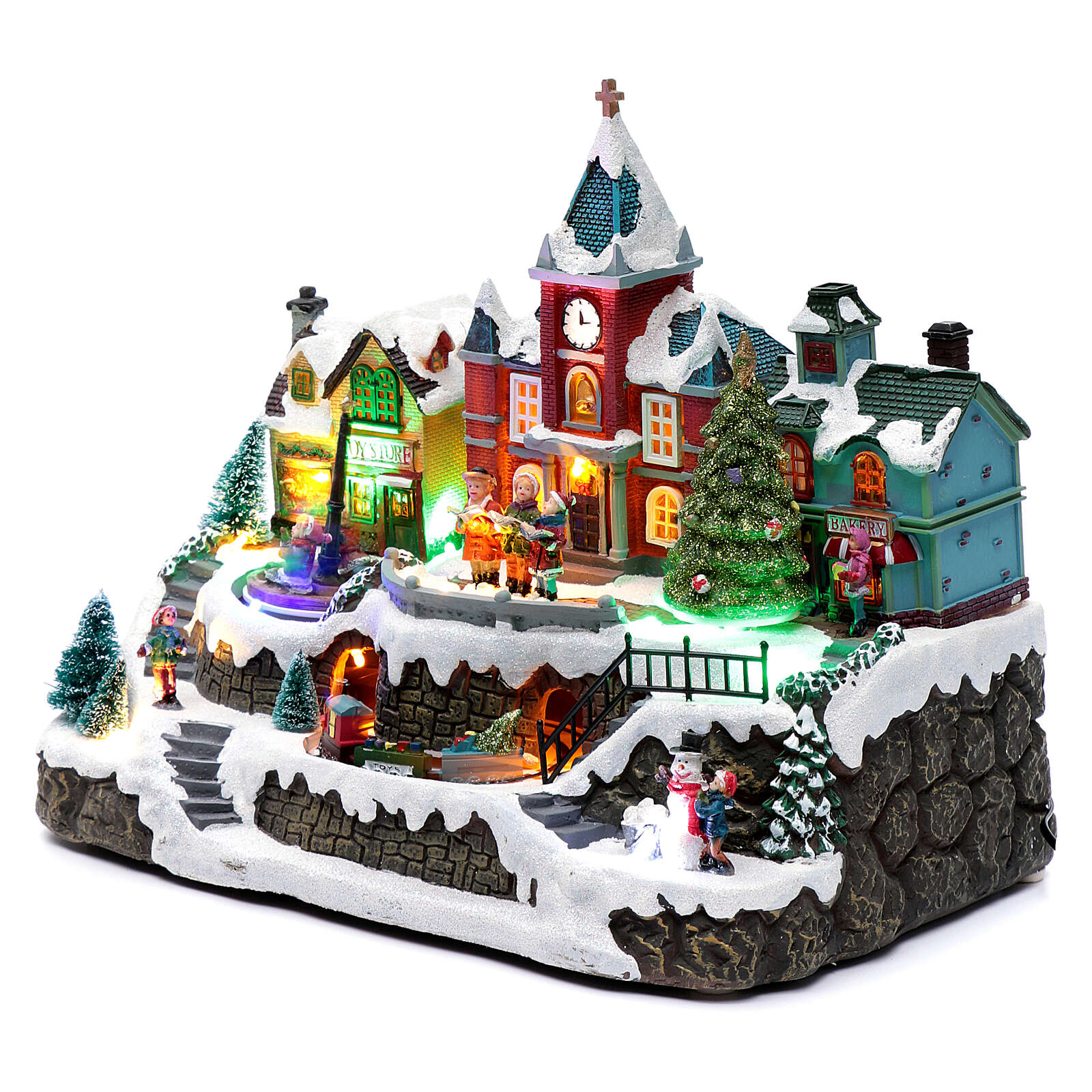 LIghted Christmas village with rotating train, fountain and online