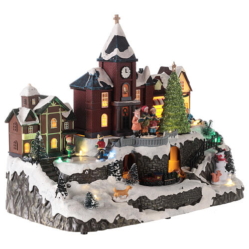 Cenário natalino em miniatura iluminado movimento trem, árvore de Natal, crianças 28x34x19 cm 4