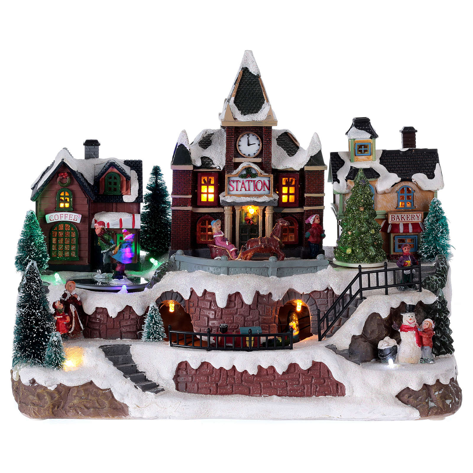 Animated musical Christmas village with train and iced lake | online ...