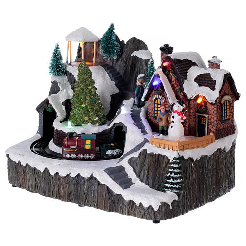 Illuminated Christmas village with music and moving train 19X23X16 cm 3