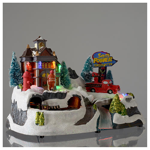 Christmas village with firemen and moving train 23X27X17 cm 4