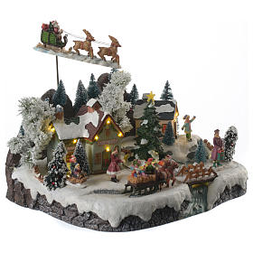 Pueblos navideños en miniatura: Aldea navideña papá noel volando en movimiento iluminado con música 30x25x25