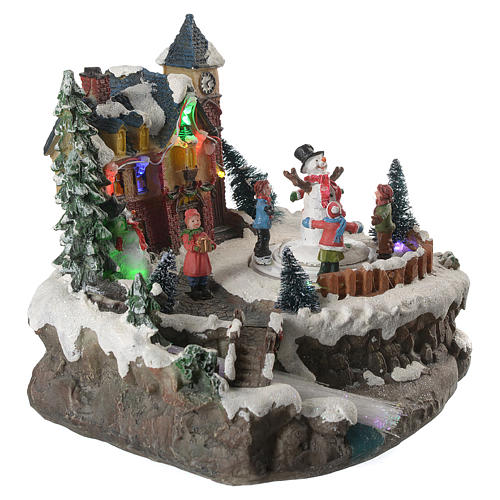 Christmas village with children and illuminated river with movement 20x20x20 3