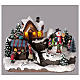 Village de Noël enfant et bonhomme de neige en mouvement éclairé 24x15x15 cm s2
