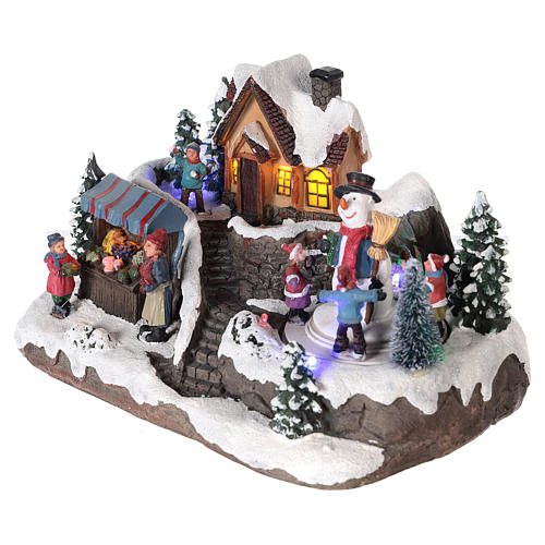 Illuminated Christmas village with snowman and turning tree 25x15x15 cm 3
