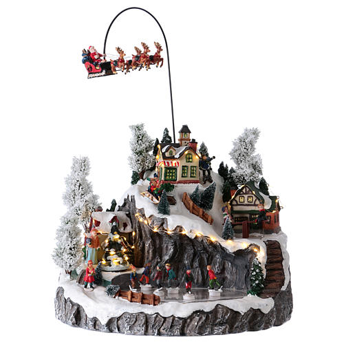 Illuminated Christmas village, animated sleigh pulled by reindeers 35x40x35 1