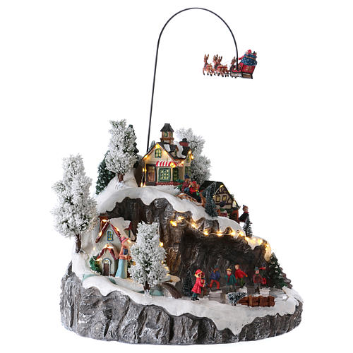 Illuminated Christmas village, animated sleigh pulled by reindeers 35x40x35 4
