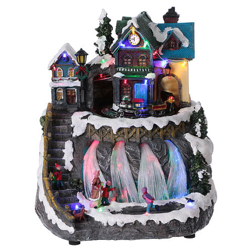 Animated musical Christmas village with train and frozen lake 30x25x30 cm 1