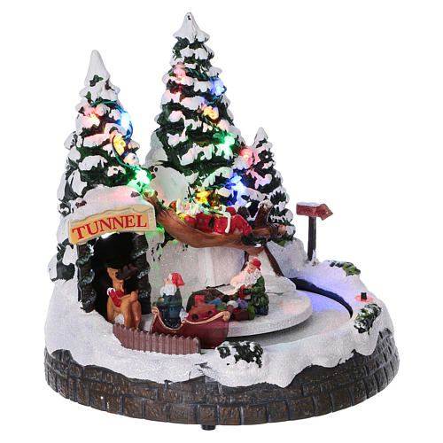 Christmas village with lights, moving train, tunnel and Santa Claus on hammock 20x20x20 cm 4