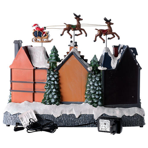 Christmas village with lights and Santa Claus movement 30x35x20 cm 5
