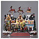 Christmas village with lights and moving Santa Claus with reindeers 30x35x20 cm s2