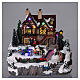 Christmas village with lights and moving ice skaters 25x25x25 cm s2