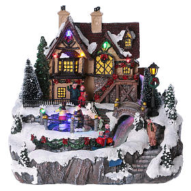 Village Noël 25x25x25 cm lumières fibre optique patineurs mouvement courant