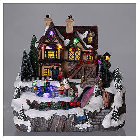 Village Noël 25x25x25 cm lumières fibre optique patineurs mouvement courant