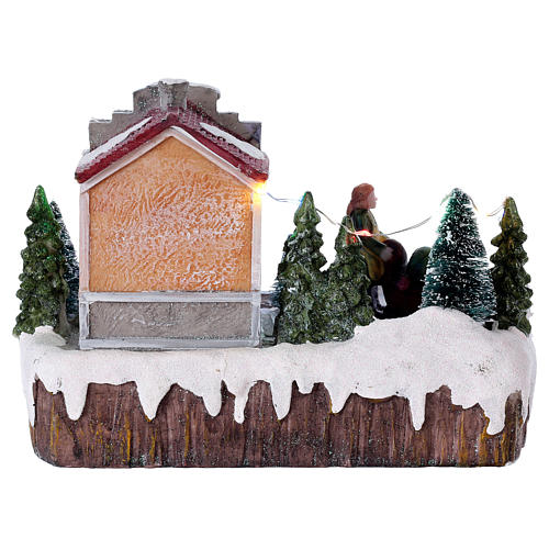 Christmas village with lights, music and moving woman with baby carriage 15x20x10 cm 5