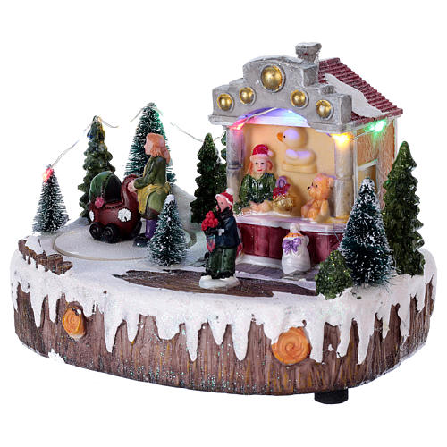 Christmas Village 15x20x10 cm with lights music and moving baby carriage 3
