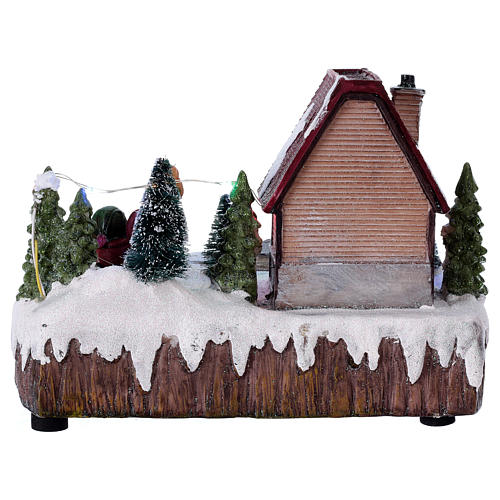 Christmas village with lights, music, shop and moving woman with baby carriage 15x20x10 cm 5
