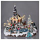 Christmas village with lights and moving ice skaters 45x50x45 cm s2