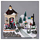 Christmas village with lights, moving ice skaters and Santa Claus 20x25x16 cm s2