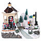 Illuminated Christmas village with animated ice skaters and Santa Claus 20x25x16 cm s1