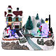 Illuminated Christmas village with animated ice skaters and toy shop 20x25x16 cm s1