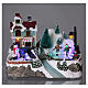 Illuminated Christmas village with animated ice skaters and toy shop 20x25x16 cm s2