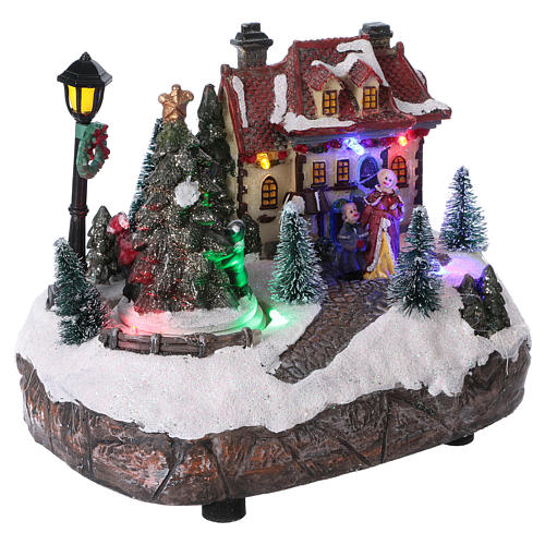 Christmas village with LED lights and rotating Christmas Tree 15x20x10 cm 4
