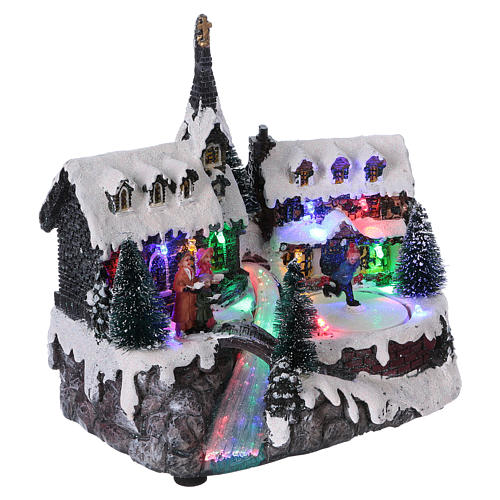 Christmas village with moving ice-skater 20x20x15 cm 4