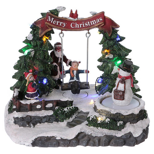 Christmas village with moving snowman and swing 20x20x20 cm 1