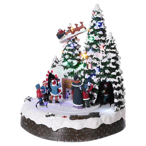 Christmas village with LED lights, moving children 30x25x25 cm 3