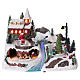 Christmas village with moving ice-skaters and Santa Claus 20x30x20 cm s1