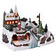 Christmas village with moving ice-skaters and Santa Claus 20x30x20 cm s4