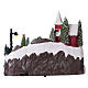 Christmas village with moving ice-skaters and Santa Claus 20x30x20 cm s5