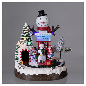 Villaggi Natalizi: Scena natalizia 30x25x20 cm treno in movimento corrente e batteria