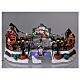 Christmas village with moving ice-skaters and gnome 20x40x25 cm s2