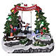 Christmas village with LED lights, moving ice-skaters and swing 20x25x20 cm s1