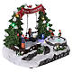 Christmas village with LED lights, moving ice-skaters and swing 20x25x20 cm s4