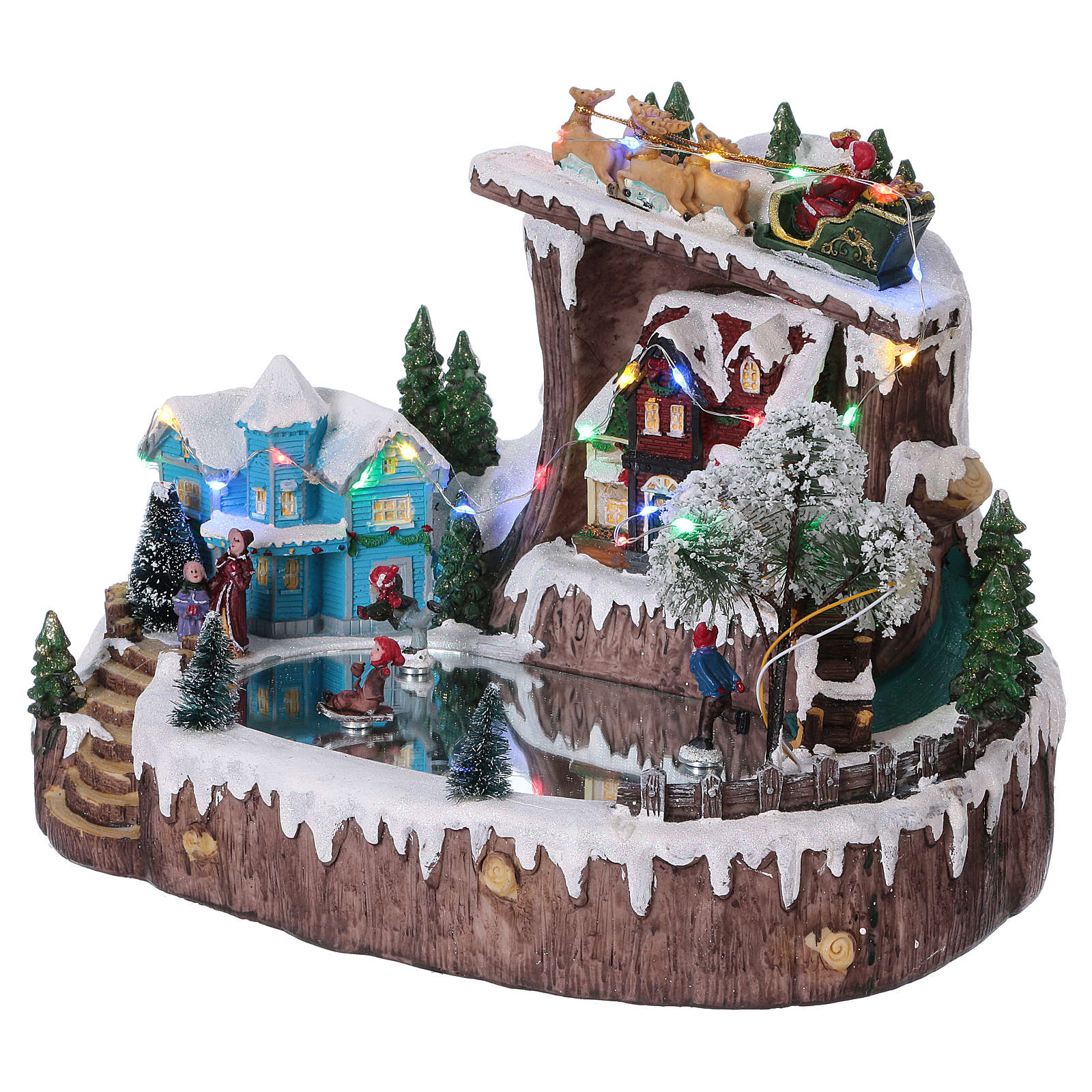 Christmas village with moving ice-skaters 25x30x20 cm | online sales on