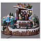 Christmas village with moving ice-skaters 25x30x20 cm s2