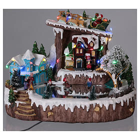 Villages de Noël miniatures: Village de Noël 25x30x20 cm patineurs mouvement piles et courant