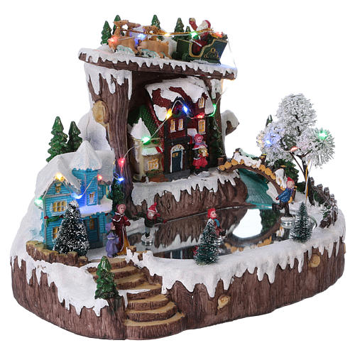 Christmas Village with Animated Skaters 25x30x20 cm Battery and Power Operated 4