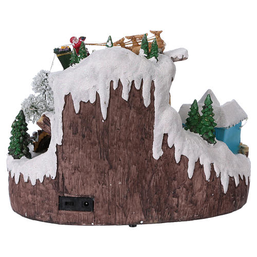 Christmas Village with Animated Skaters 25x30x20 cm Battery and Power Operated 5