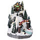 Christmas village 25x25x35 cm with moving skiers requiring batteries or electricity s1