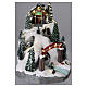 Christmas village 25x25x35 cm with moving skiers requiring batteries or electricity s2